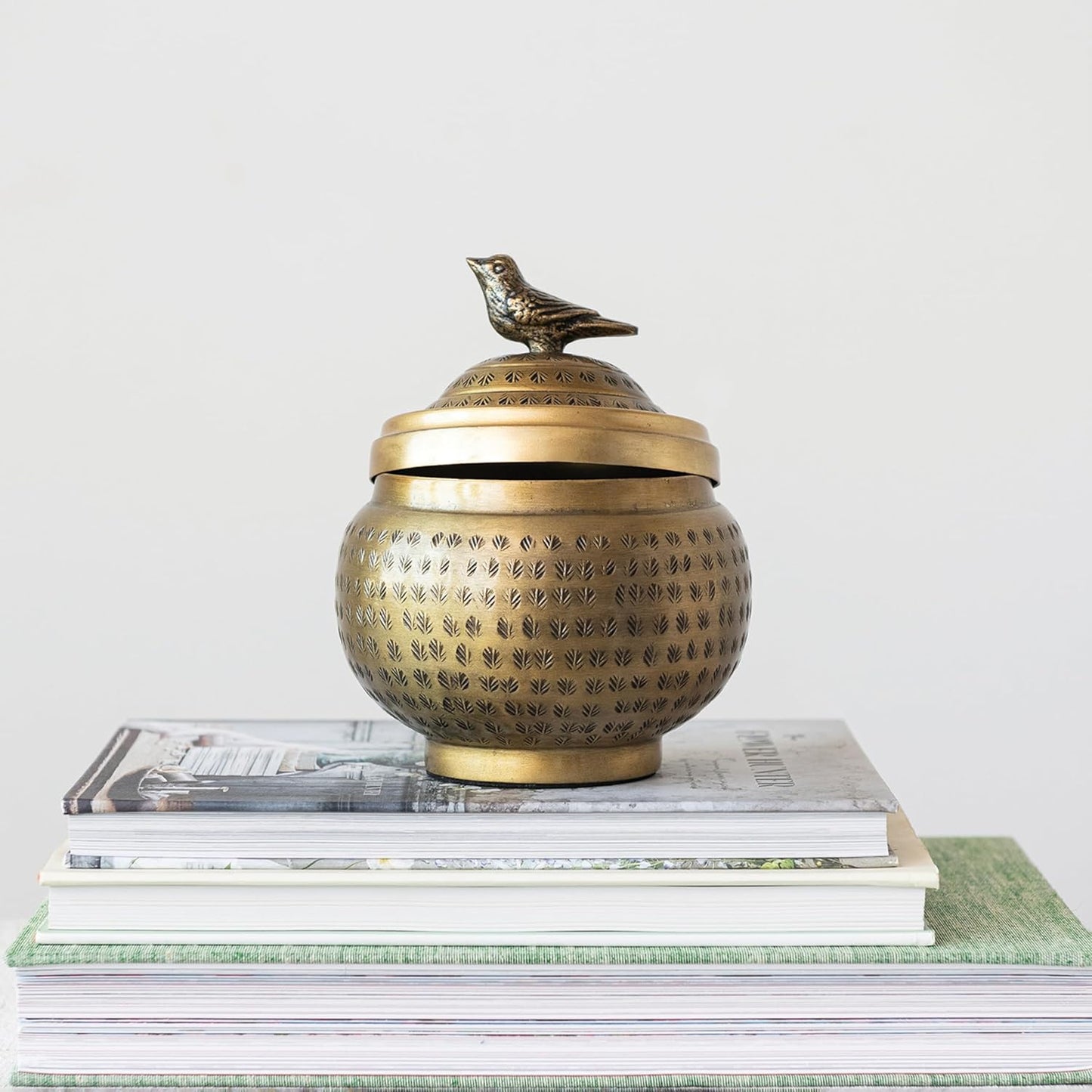 Regine Switzerland Round Hammered Metal Container - Elegant Bird Finial in Brass Finish
