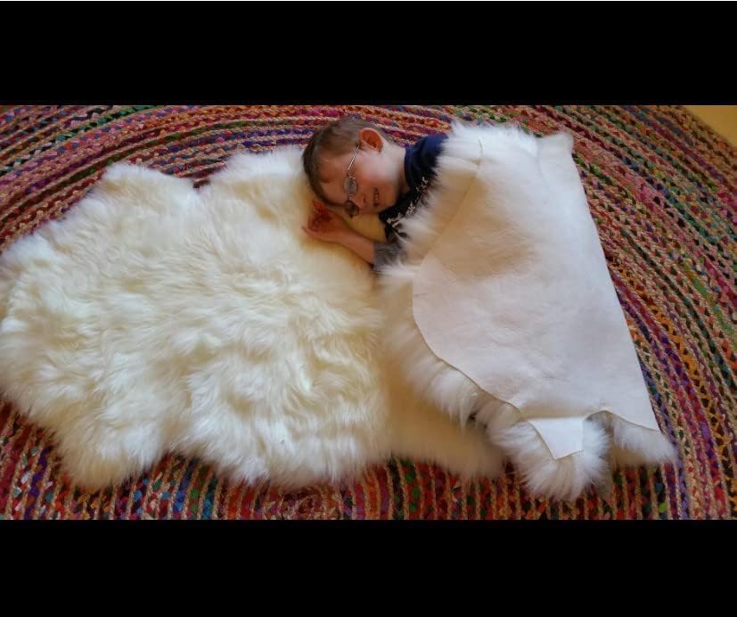 Woolous Sheepskin Rug, Genuine New Zealand Natural Lambskin Wool Real Sheep Skin Fur Throw Area Rug for Living Room, Bedroom, Sofa or Chair Covers (Single pelt 2x3 ft, Ivory White)