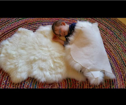 Woolous Sheepskin Rug, Genuine New Zealand Natural Lambskin Wool Real Sheep Skin Fur Throw Area Rug for Living Room, Bedroom, Sofa or Chair Covers (Single pelt 2x3 ft, Ivory White)