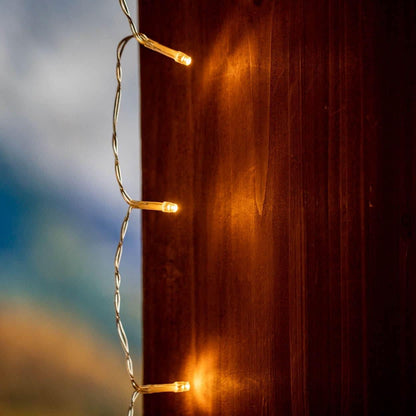 Novelty Lights LED Curtain Light Set - 300 Warm White LEDs with 8 Functions | Clear Wire Design
