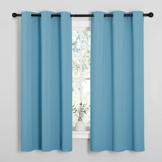 NICETOWN Thermal Insulated Curtains Blackout Draperies, Window Treatment Solid Grommet Room Darkening Drape Panels for Bedroom (Teal Blue, Set of 2 Panels, 34 by 63 inches Long)