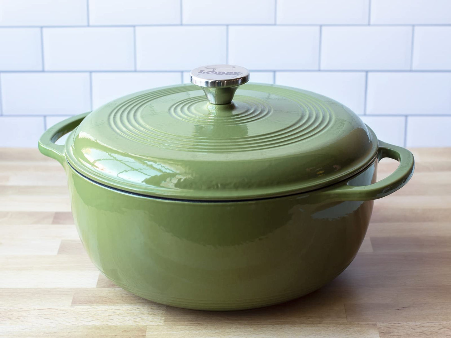 Lodge 6 Quart Enameled Cast Iron Dutch Oven with Lid – Dual Handles – Oven Safe up to 500° F or on Stovetop - Use to Marinate, Cook, Bake, Refrigerate and Serve – Holiday Green