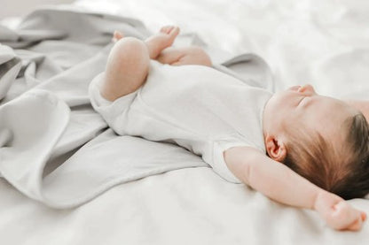 The Ollie Swaddle - Helps to Reduce The Moro (Startle) Reflex - Made from a Custom Designed Moisture-Wicking Material (Stone)