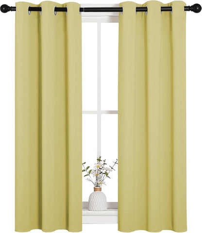 NICETOWN Blackout Window Curtain Panels - Thermal Insulated Grommet Drapes | Paler Yellow, 29x45 Inch (1 Pair)