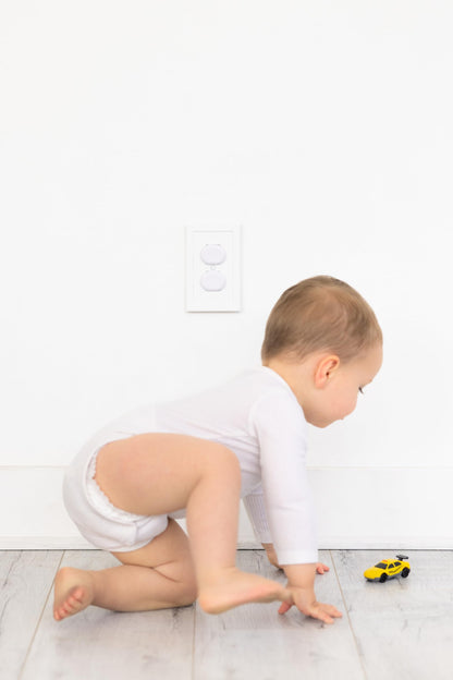 Ubbi Safety Bundle, Safeguarding and Baby Proofing Set, Includes 36 Outlet Covers, 16 Table Corner Protectors and 2 Pinch Guards, Child Safety Kit, White