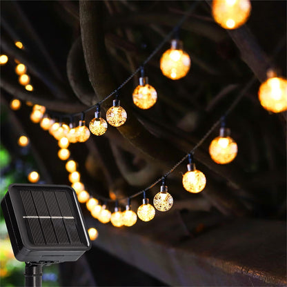 ANJAYLIA 23Ft 50LED Solar Outdoor String Lights with 8 Lighting Modes Warm White