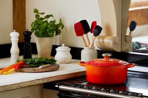 Le Creuset Enameled Cast Iron Dutch Oven - 5.5 Qt. | Signature Flame Color for Perfect Cooking