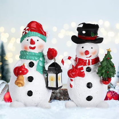 Amosfun Christmas Snowman Figurines - 2pcs Resin Ornaments for Holiday Decor | 6 Inch Tall Centerpieces
