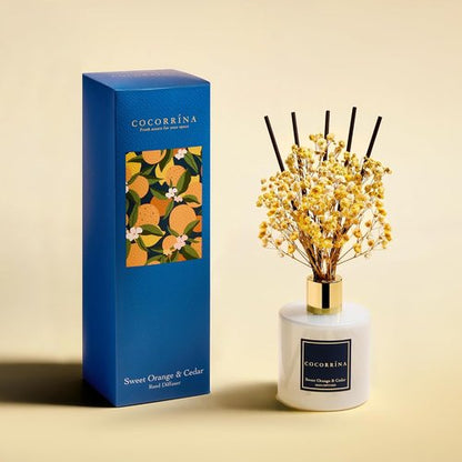 COCORRÍNA Reed Diffuser - Sweet Orange & Cedar Aroma | 6.7 Fl. Oz Set with Sticks & Baby's Breath Decor