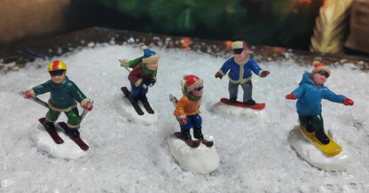 Moments In Time Christmas Village Set - Hand-Painted Skiing & Snowboarding Figures | 5-Piece Holiday Decor