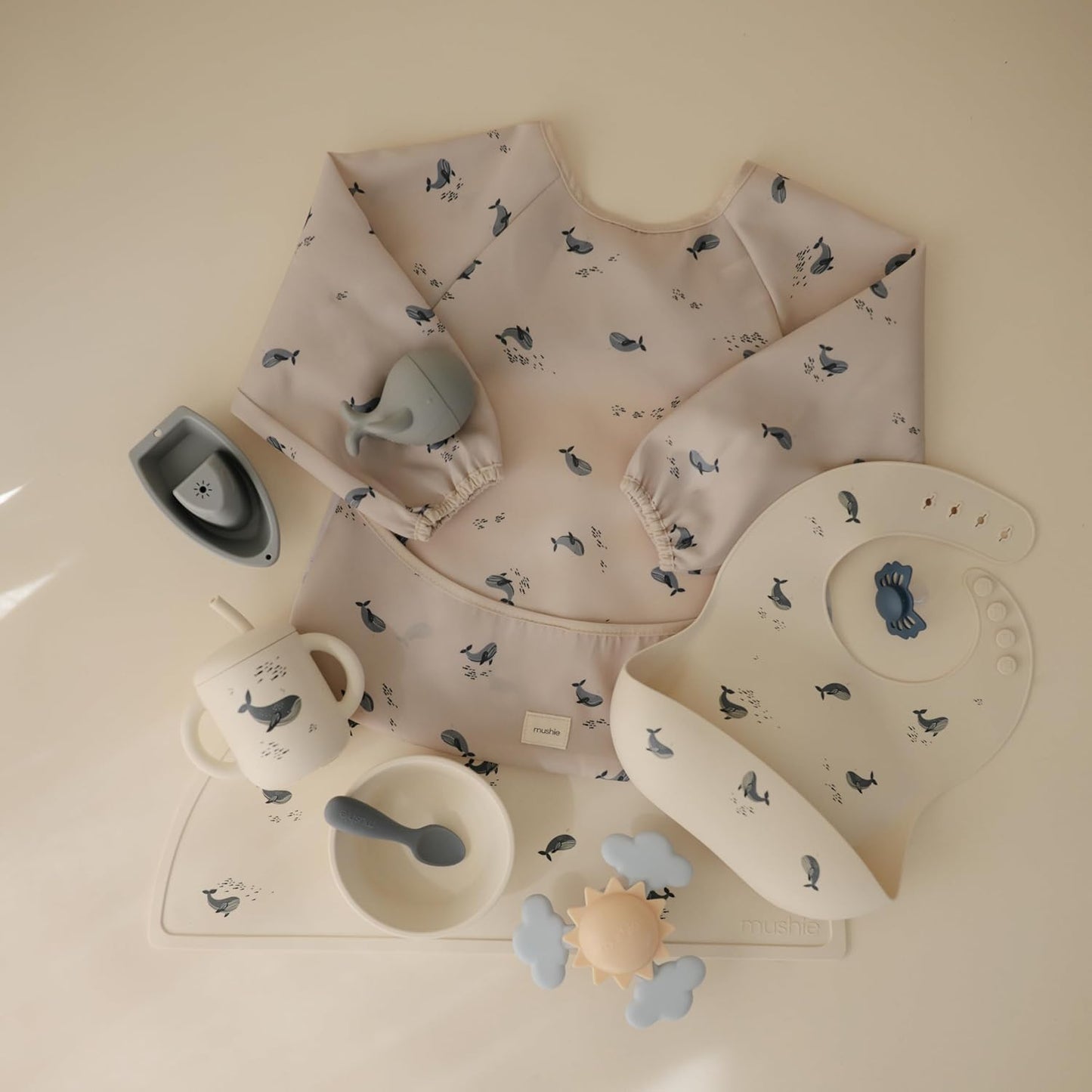 Mushie Long Sleeve Baby Bib - Water-Resistant & Adjustable Fit for 6-24 Months