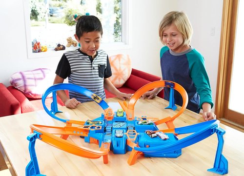 Hot Wheels Track Set - Motorized Booster with 4 Intersections for Epic Crashing Fun | 1:64 Scale Toy Car