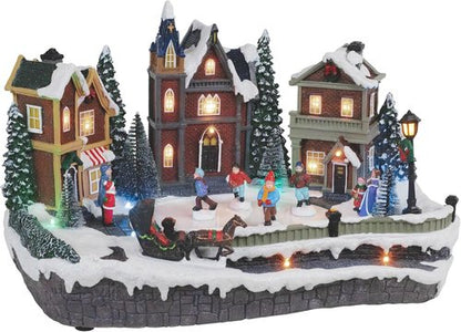 Large Animated Christmas Village Skating Town - Lighted Musical Snow Scene with 4 Moving Skaters