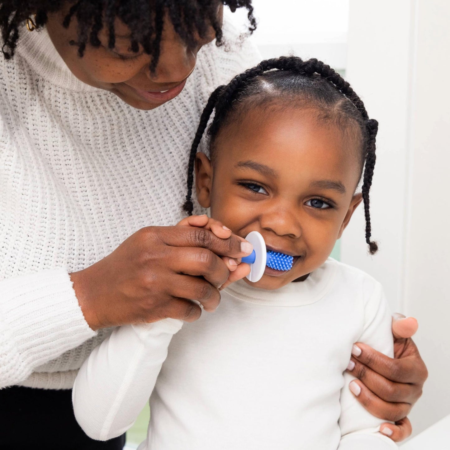 Ubbi Grow with Me Toothbrush Training Set for Babies and Toddlers, Includes One 360° Food-Grade Platinum Silicone and One Soft Bristled Toothbrush, Polaris Blue and Zest Green