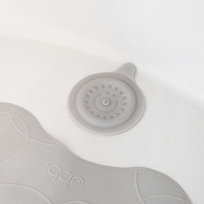 Ubbi Bathtub Drain Cover - Silicone Suction Stopper for Baby Bath Time | Gray Color
