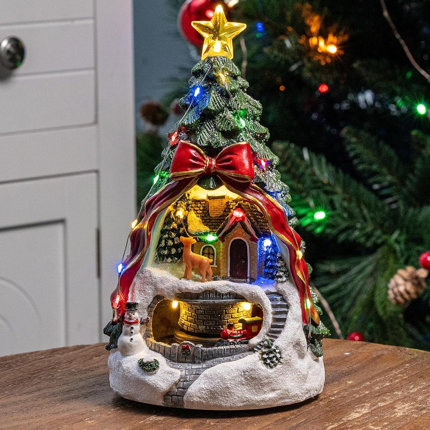 MXwcy Animated Musical Christmas Tree Village - Lighted Figurine with Spinning Santa Train | Plays 8 Holiday Carols, Perfect Tabletop Decor