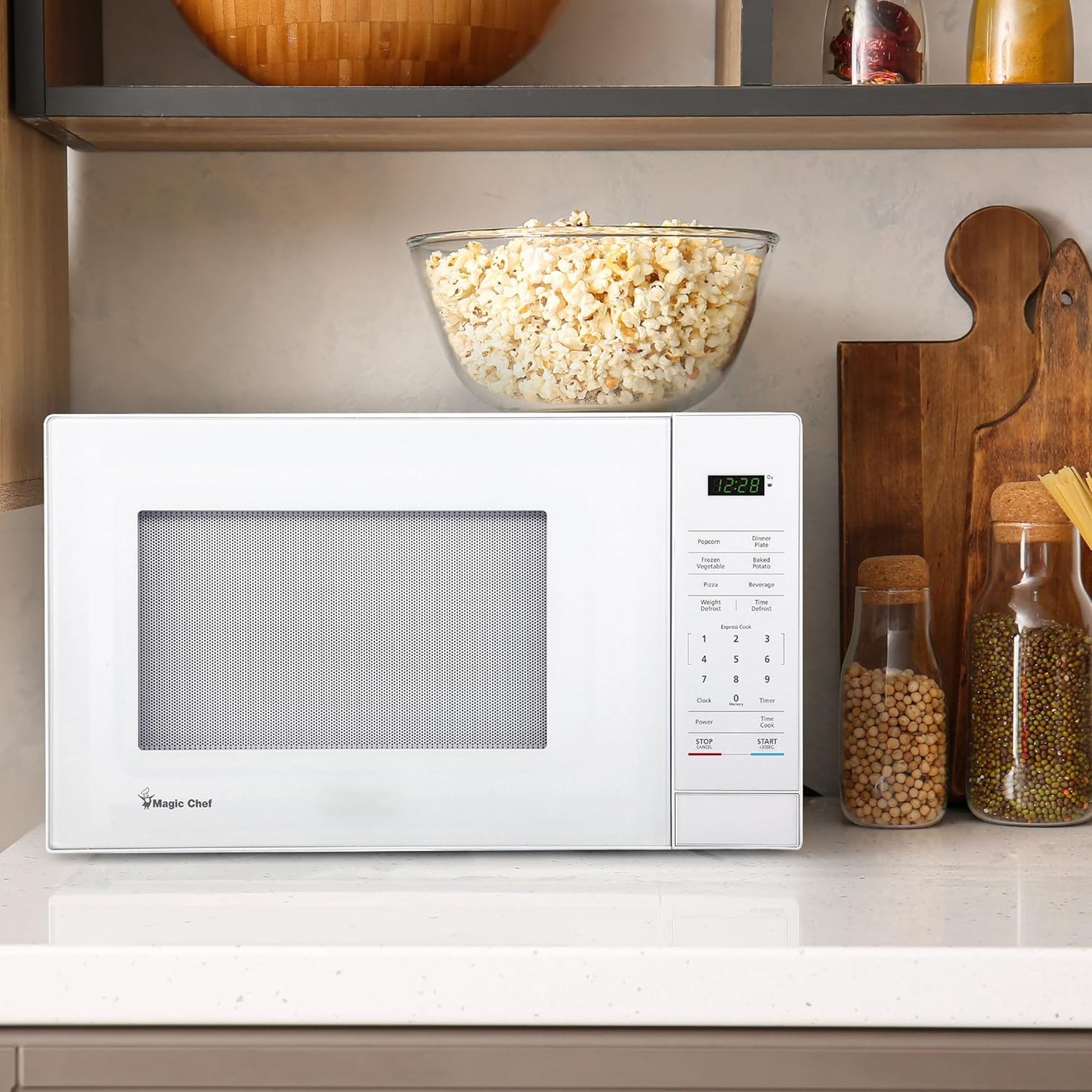 Regine Switzerland 1.1 Cu. Ft. Countertop Microwave Oven - Sleek White Design for Modern Kitchens