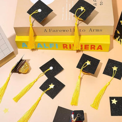 FYSUIMU Graduation Cap Cupcake Toppers - 60 Sets of Mini Black Grad Hats with Tassels & Stickers