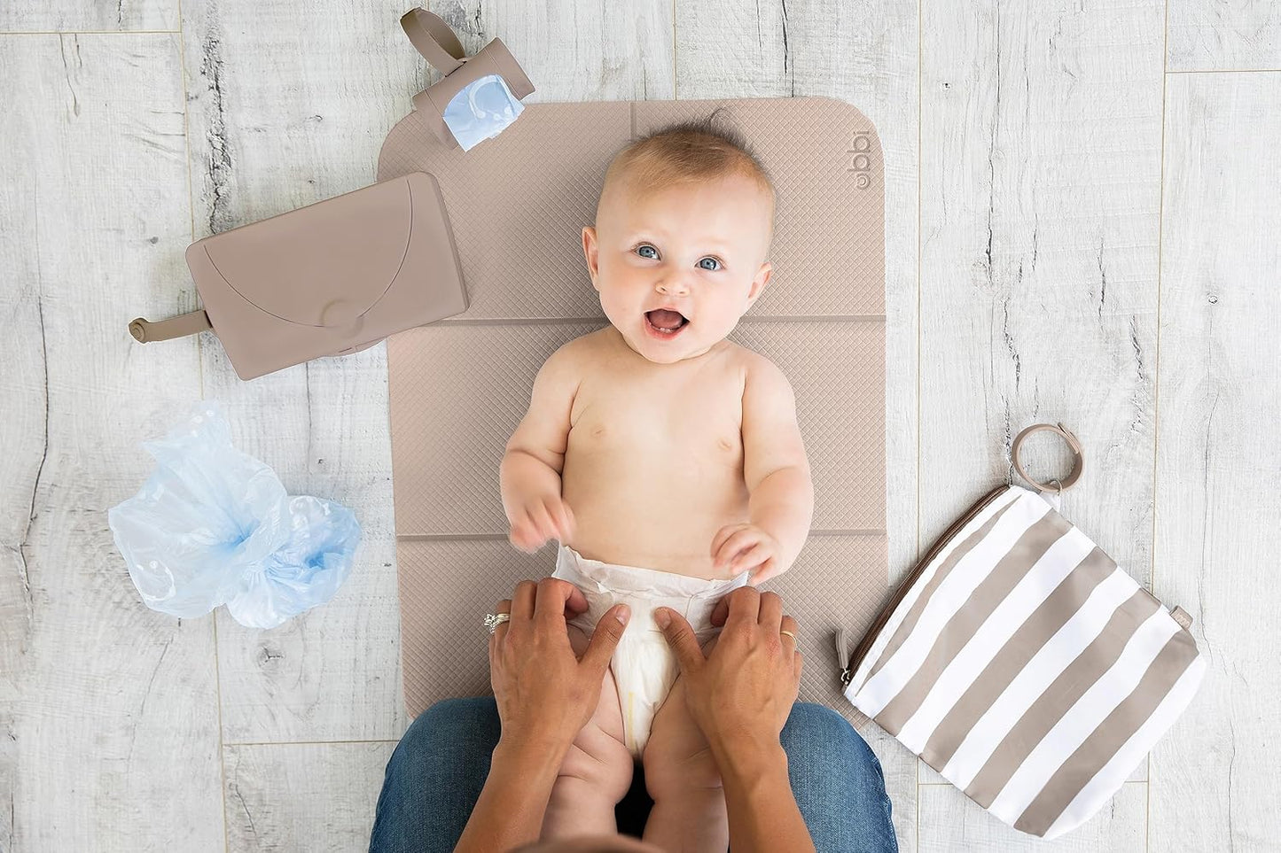 Ubbi On-The-Go Diaper Changing Mat - Soft, Portable & Easy to Clean Baby Accessory | Taupe