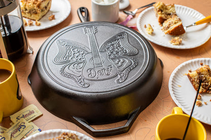 Lodge 12 Inch Dolly Parton Pre-Seasoned Cast Iron Stamped Skillet - Signature Teardrop Handle - Use in the Oven, on the Stove, on the Grill, or Over a Campfire, Black